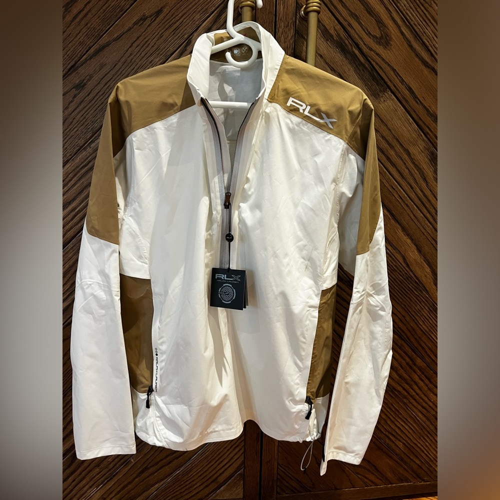 Ralph Lauren Tan and white men’s waterproof wind breaker. Size Large